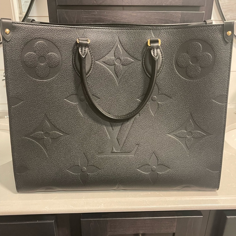 ((((SOLD)))) **AUTHENTIC** ONTHEGO GM Monogram Empreinte Giant Embossed Tote